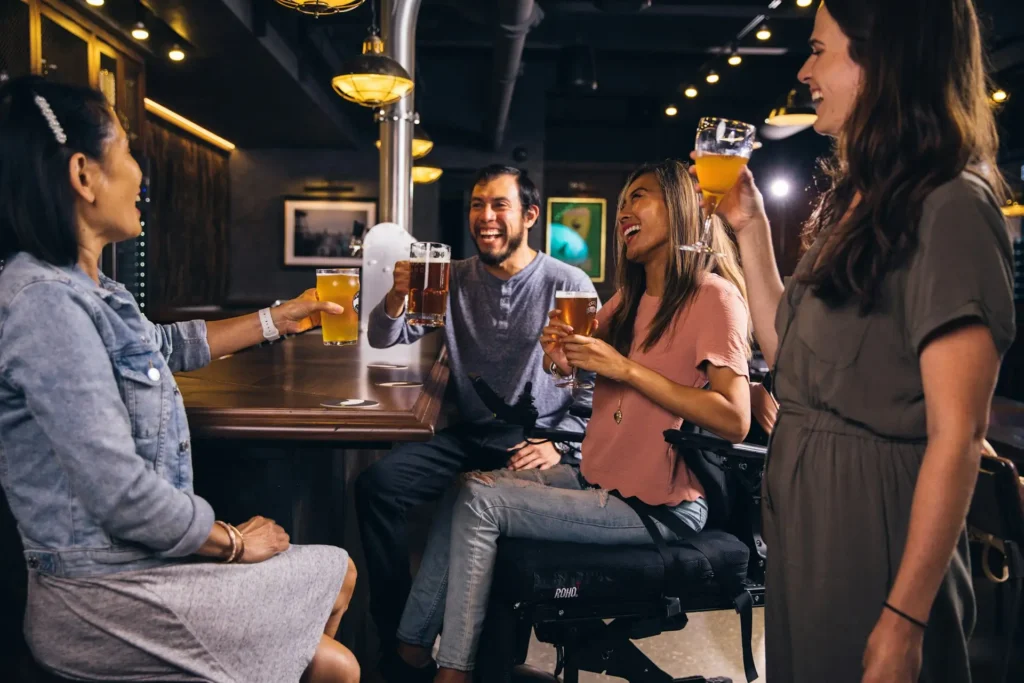 Students and backpackers socialising at a student bar in Berlin