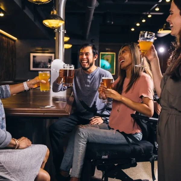 Students and backpackers socialising at a student bar in Berlin
