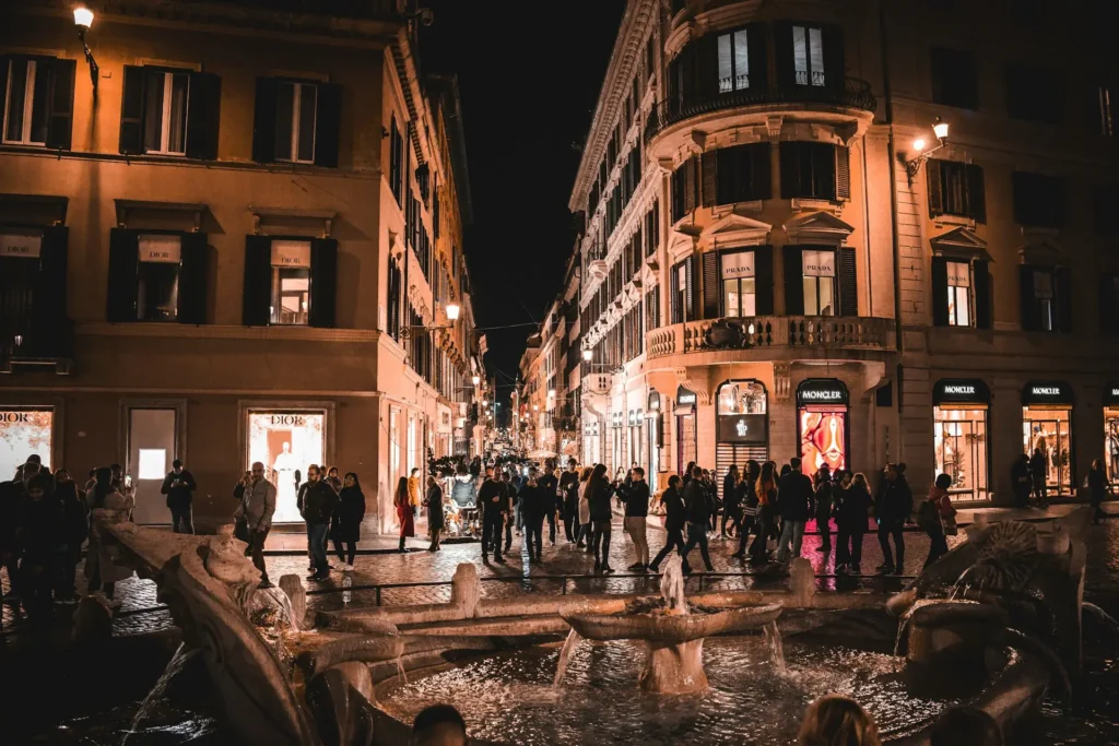 Rome nightlife scene with people enjoying aperitivo at outdoor bars and restaurants